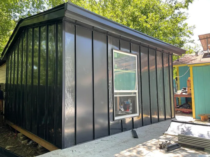 Black standing seam metal wall panels for Roof Inspection in Pine Hill