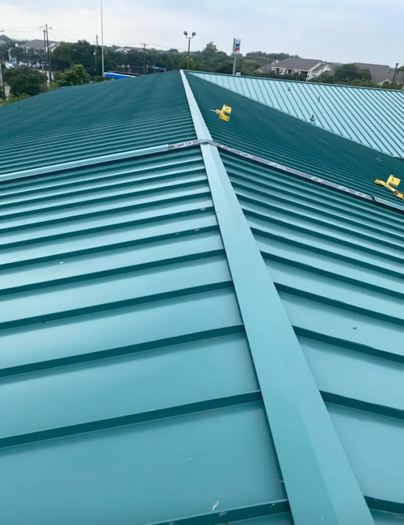 Green commercial metal roof ridge and valley for Metal Roof Repair in Pine Hill